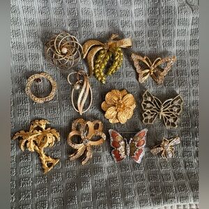 Collection of estate brooches pins 11 total butterfly bee Swarovski Joan rivers